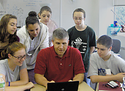 Social Studies teacher Paul Bogush and students